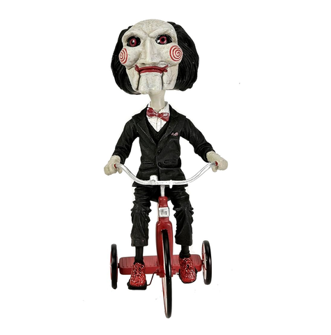 Official Neca The Conjuring Universe:  Billy the Puppet with Tricycle Head Knocker Figure (20cm)